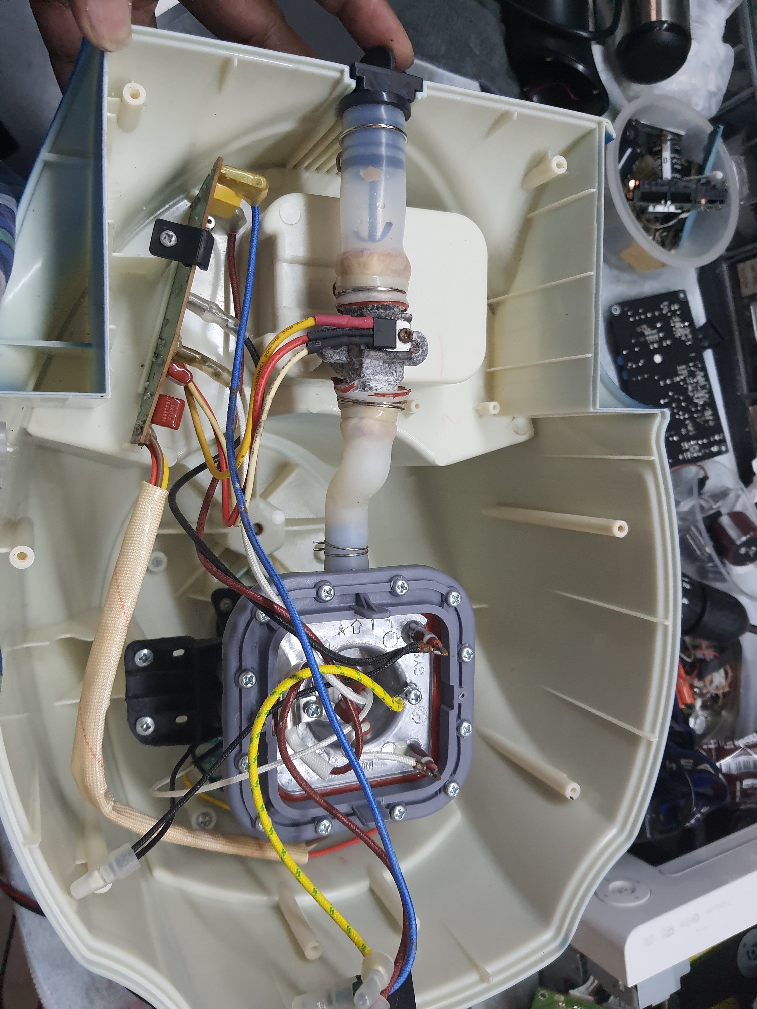 ซ่อมเตารีดไอน้ำ ยี่ห้อ @HOME รุ่น HO0065 อาการไอน้ำไม่ออก