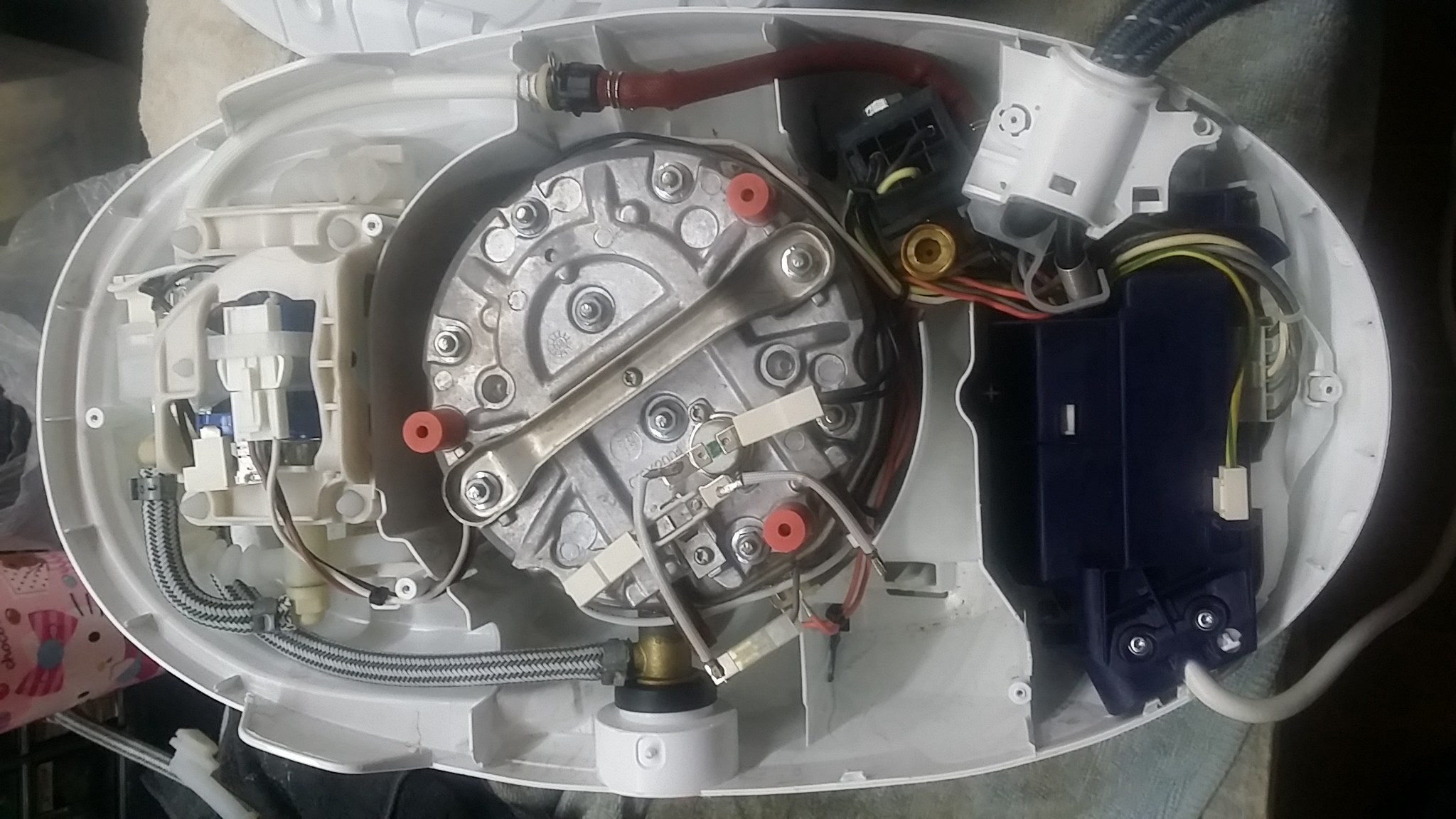 ซ่อมเตารีดไอน้ำ ยี่ห้อ TEFAL รุ่น GV9582 อาการได้ยินเสียงปั้มทำงานแต่ไอน้ำไม่ออก