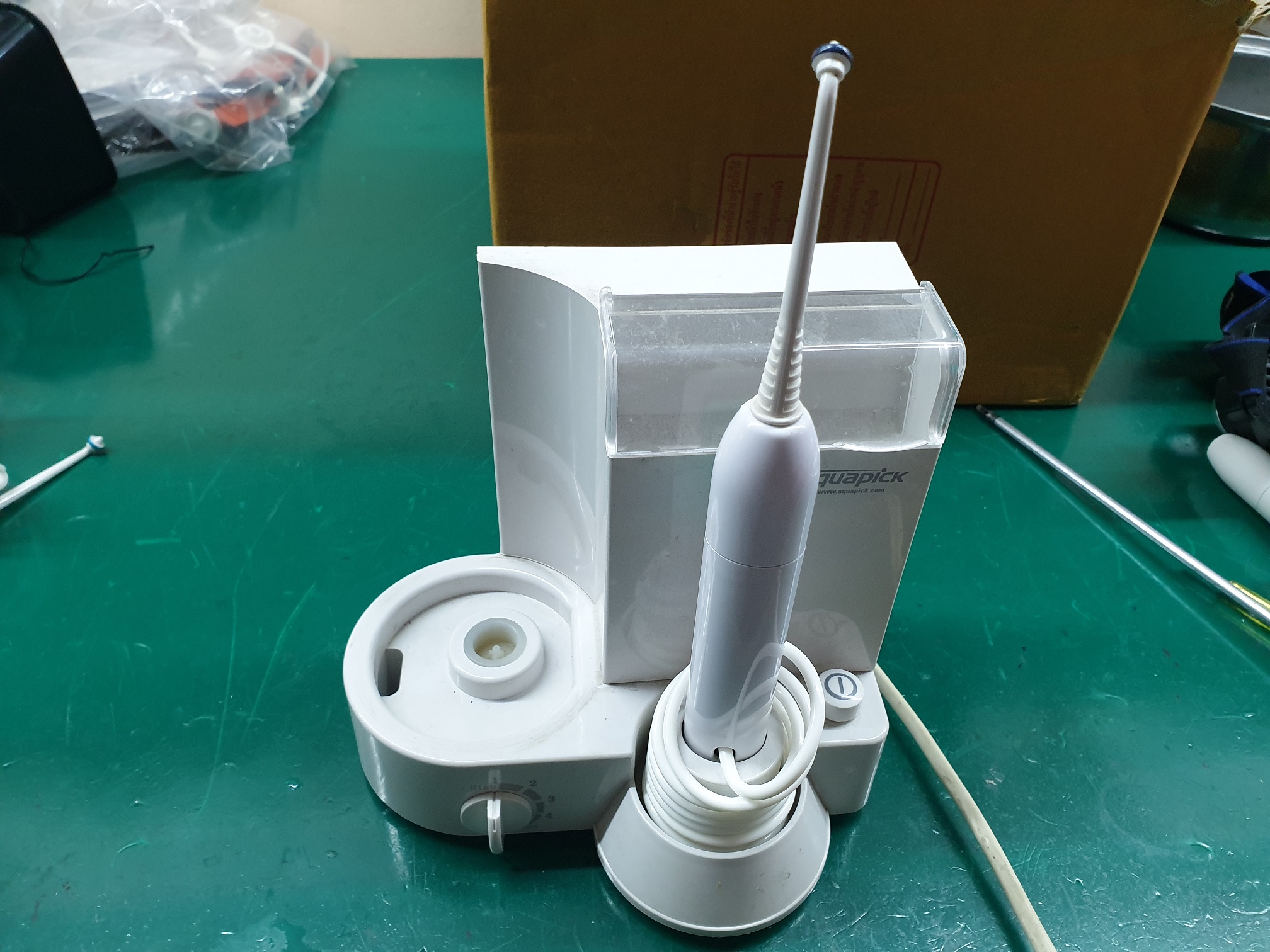 ซ่อมเครื่องทำความสะอาดฟัน ยี่ห้อ Aquapick รุ่น CN-120 อาการท่อส่งน้ำขาด