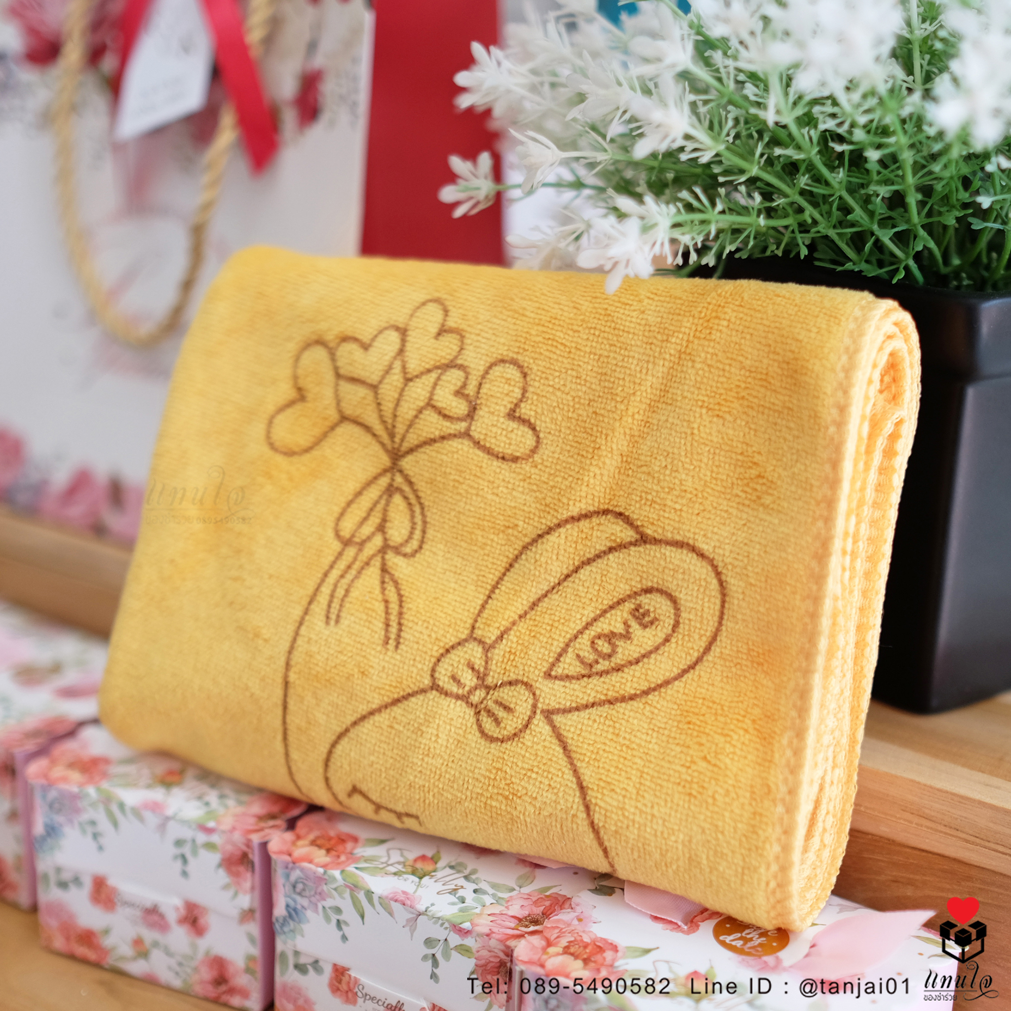 ของรับไหว้ผ้าเช็ดผมในถุงหูหิ้วผูกโบว์ พร้อมป้ายชื่อ ของรับไหว้ผู้ใหญ่ ราคาไม่เกิน 60 บาท ของรับไหว้ผ้านาโน