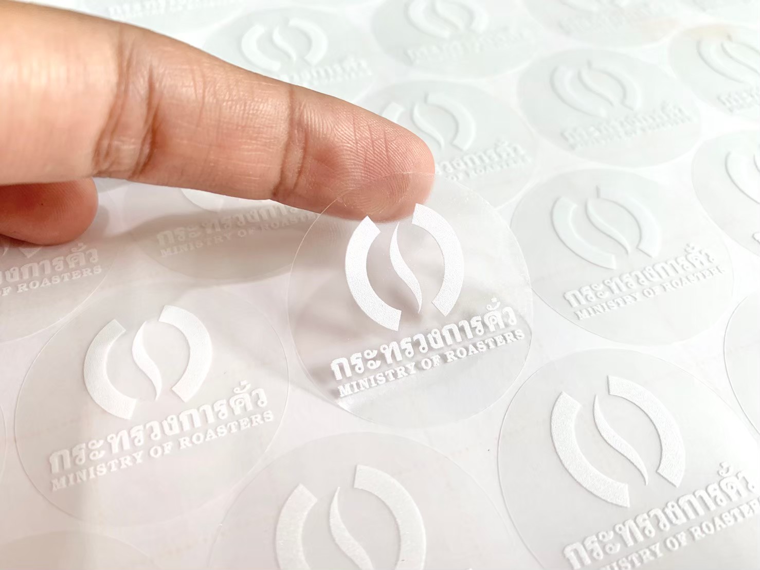 ฉลากสินค้าใสตัวหนังสือขาว สติ๊กเกอร์ใสพิมพ์สีขาว พิมพ์หมึกขาว