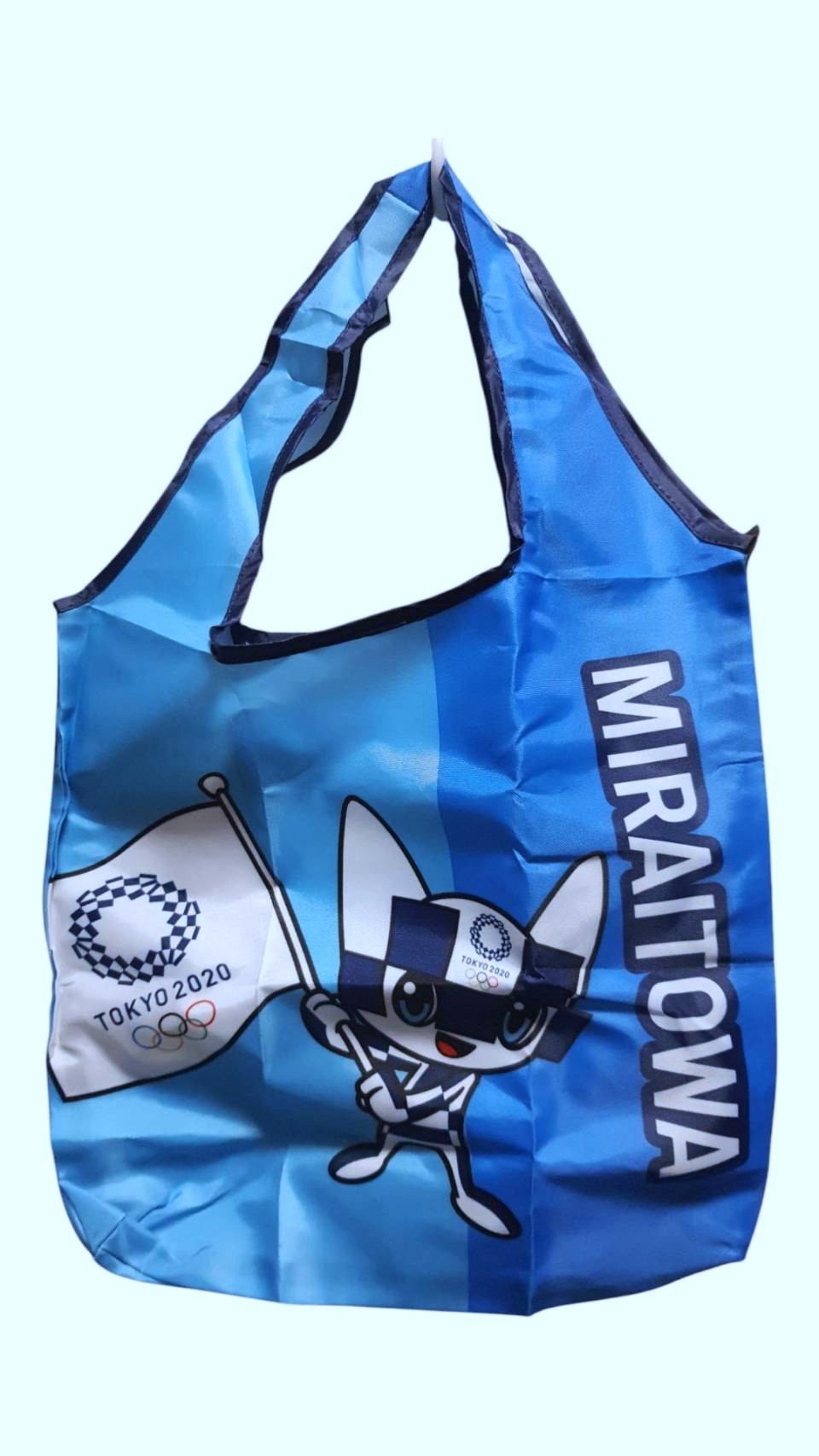 ของแท้จากญี่ปุ่น TOKYO Olympics 2020 กระเป๋าผ้าพับได้ โตเกียวโอลิมปิก 2020 Miraitowa น้ำหนักเบา ใส่ของจุ เก็บของได้เยอะ Size : 55 x 36 cm ตอนพับเก็บ 15 x 12 cm