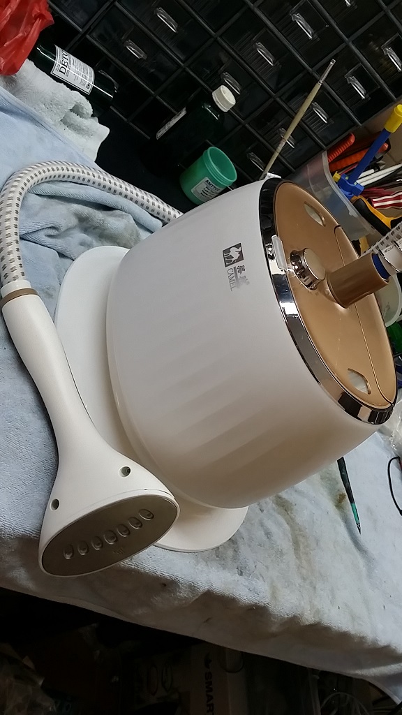 ซ่อมเตารีดไอน้ำ ยี่ห้อ CAMEL อาการไอน้ำไม่ออกและมือจับร้อนมาก