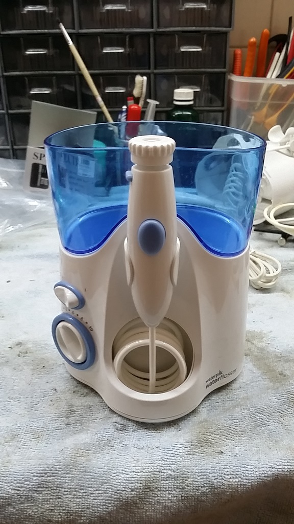 ซ่อมเครื่องทำความสะอาดฟัน ยี่ห้อ WATERPIK รุ่น WP-100W อาการน้ำไม่ออก