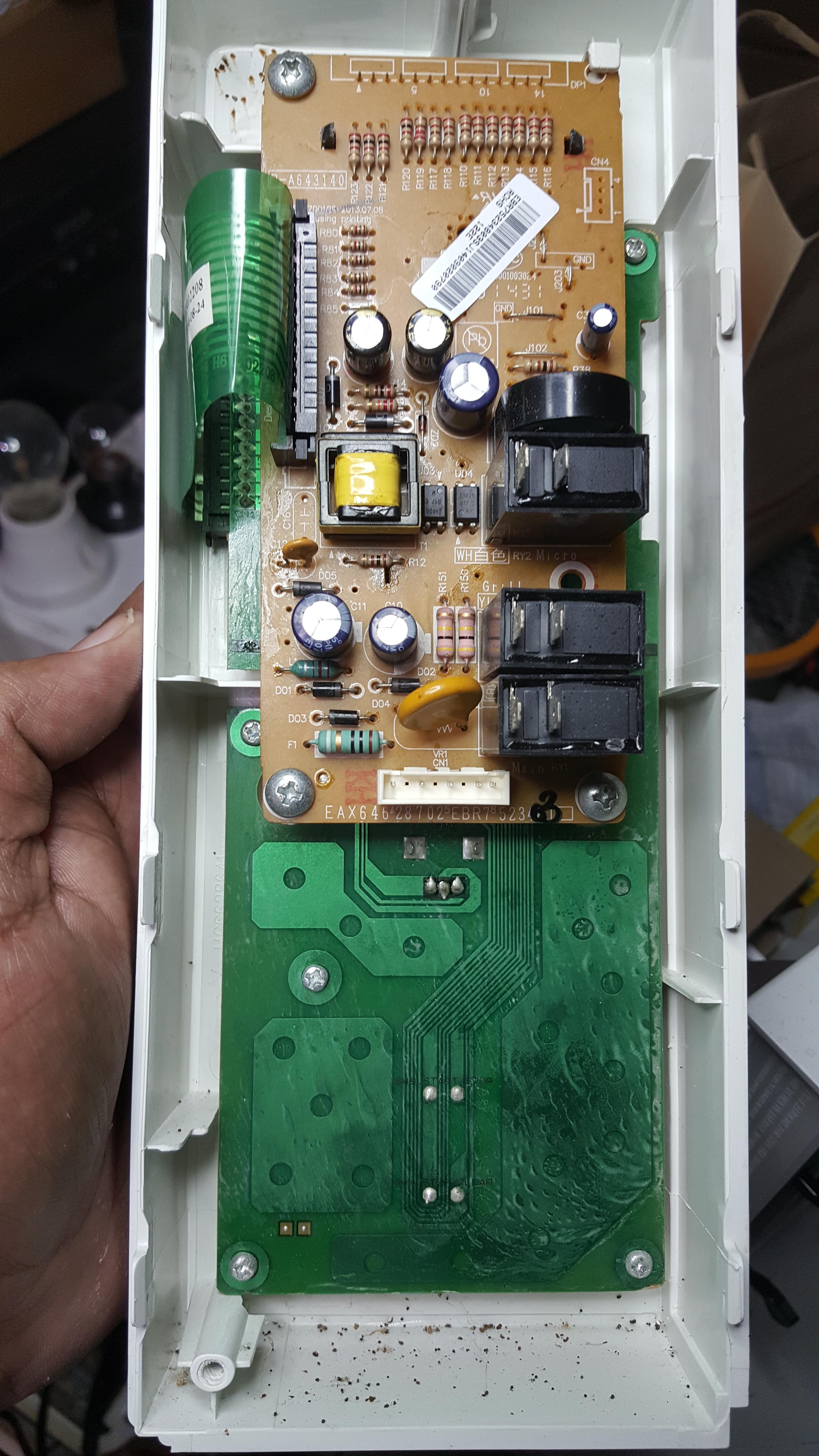 ซ่อมเตาอบไมโครเวฟ ยี่ห้อ LG รุ่น MH638BAR อาการปุ่มหมุนตั้งเวลาไม่ได้