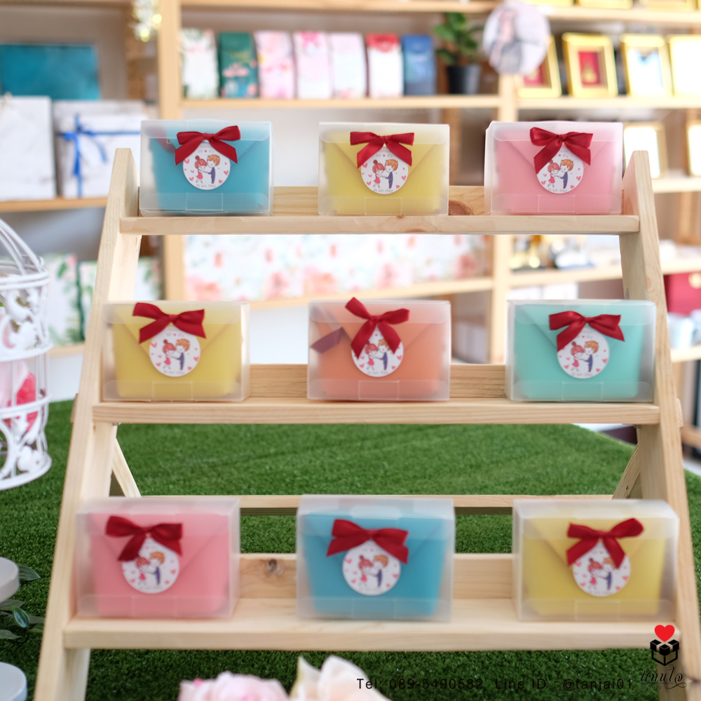 ของชำร่วยงานแต่งงาน กระเป๋าใส่เหรียญสีพาสเทล ติดสติ๊กเกอร์ป้ายชื่อ และโบว์ เลือกสีโบว์ตามธีมงานได้จ้า