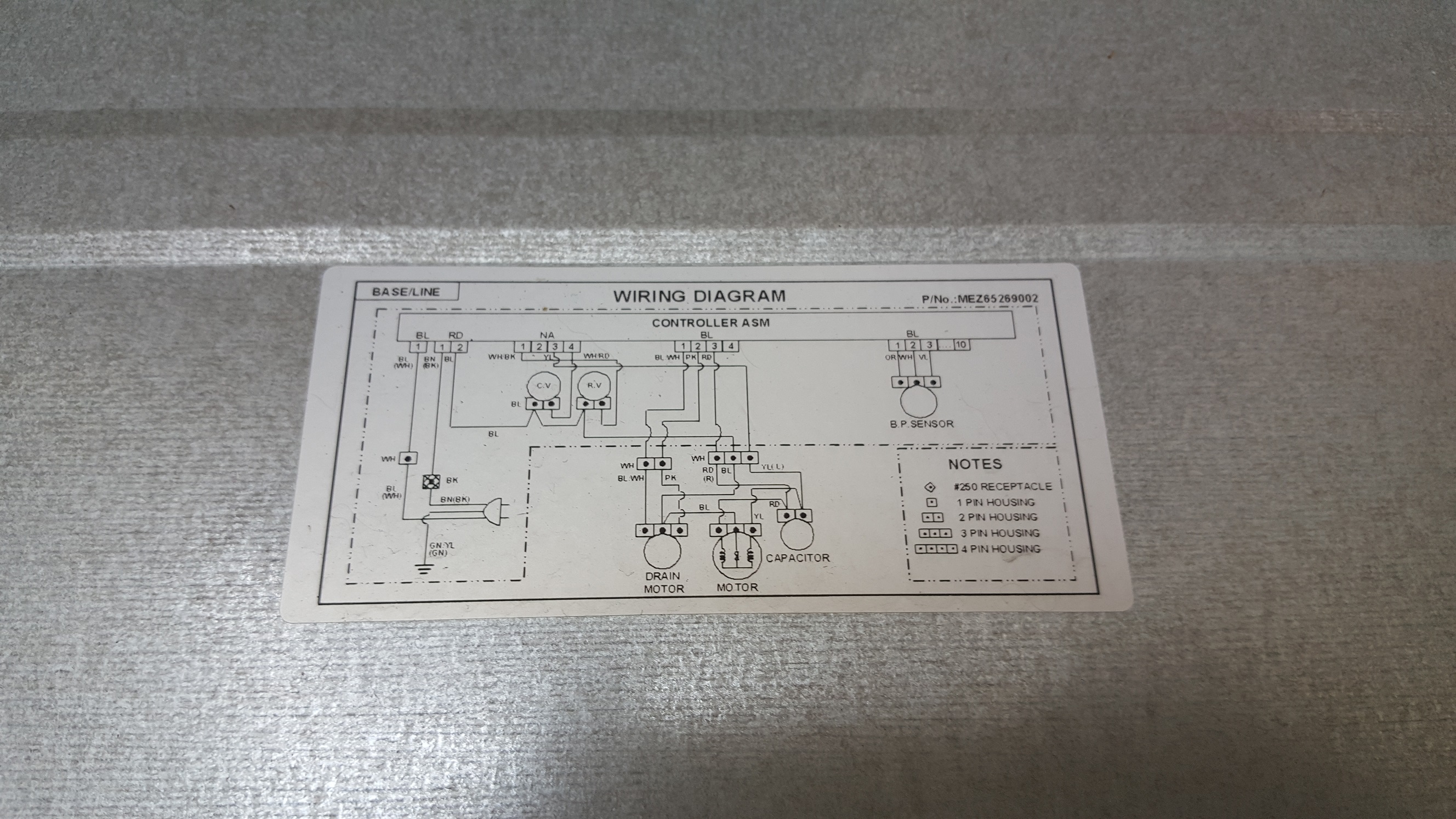 ซ่อมเครื่องซักผ้า ยี่ห้อ LG รุ่น WF-T1256TD อาการน้ำไหลออกตลอด