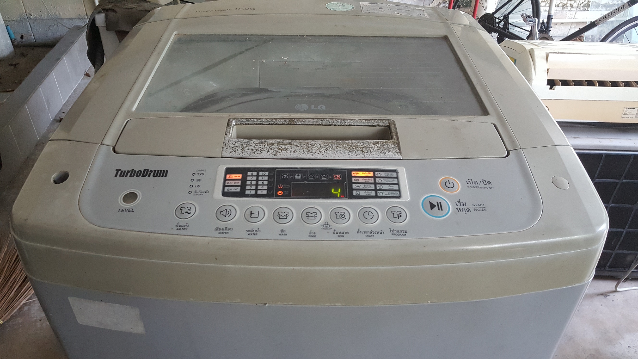 ซ่อมเครื่องซักผ้า ยี่ห้อ LG รุ่น WF-T1255TD อาการน้ำล้นถังซัก