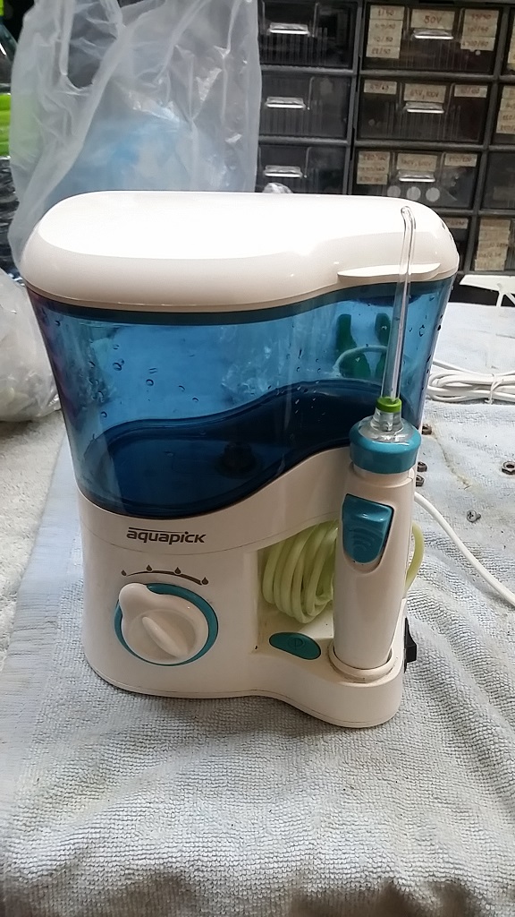 ซ่อมเครื่องทำความสะอาดฟัน ยี่ห้อ AQUAPICK รุ่น AQ-300 อาการเปิดไม่ติด