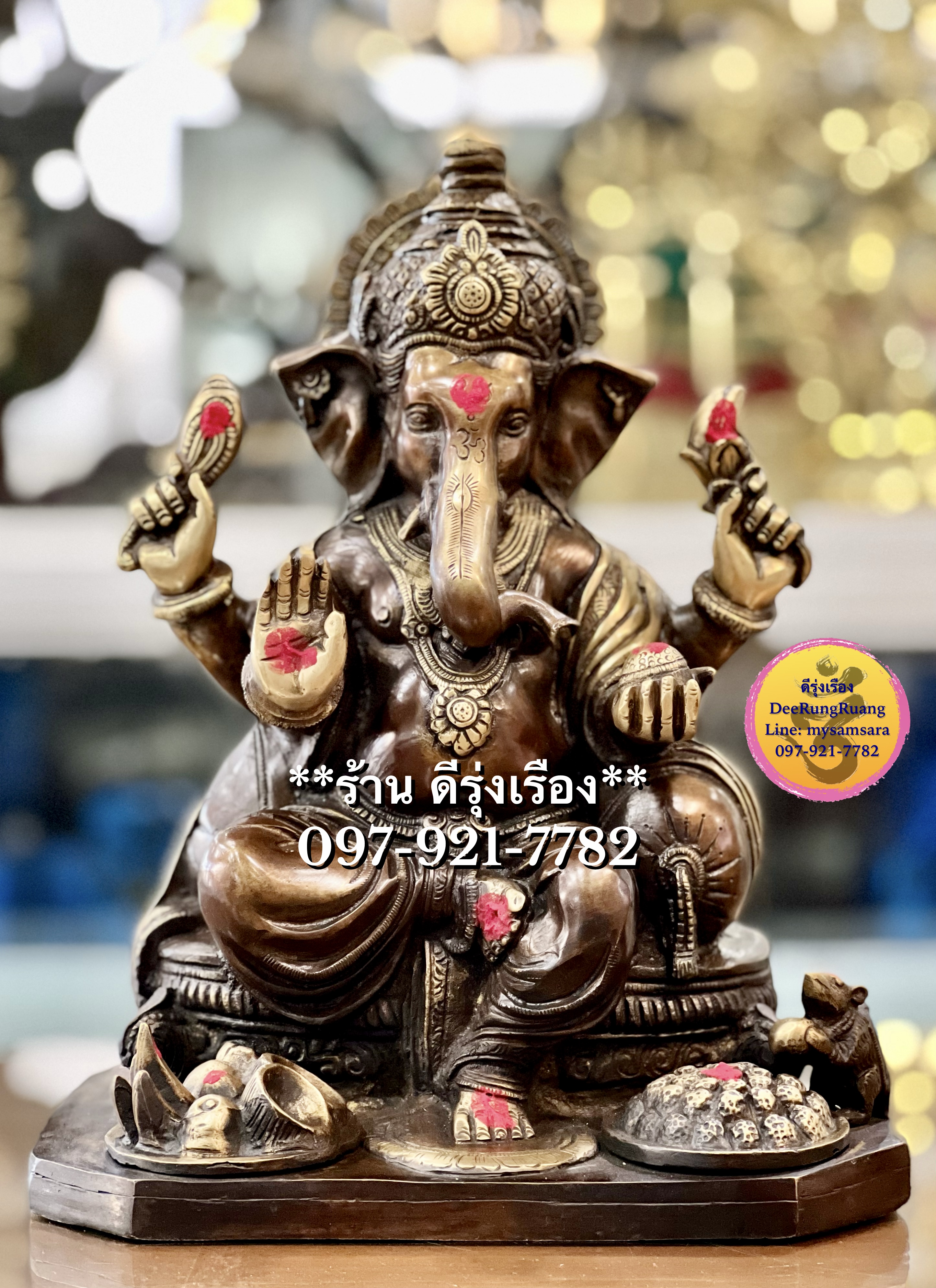 พระพิฆเนศ ประทานพร ประทับบัลลังก์ ***ที่ฐานมีเครื่องถวายขนมโมทกะ และ ผลไม้***