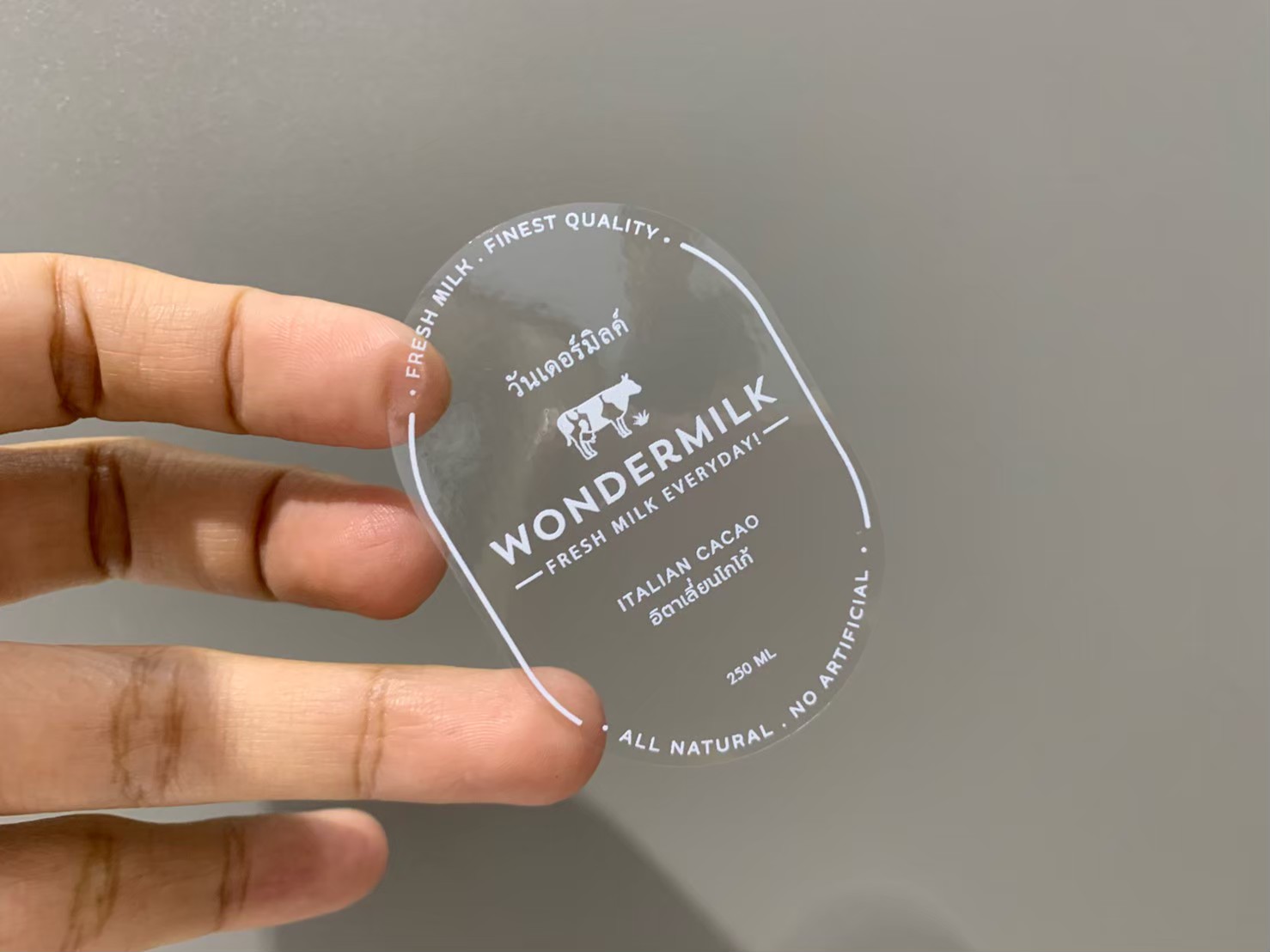 ฉลากสินค้าใสตัวหนังสือขาว สติ๊กเกอร์ใสพิมพ์สีขาว พิมพ์หมึกขาว