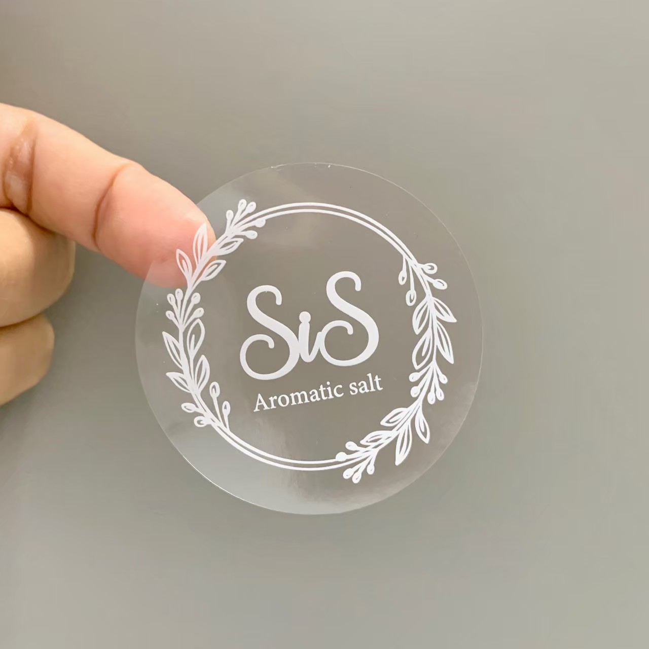 ฉลากสินค้าใสตัวหนังสือขาว สติ๊กเกอร์ใสพิมพ์สีขาว พิมพ์หมึกขาว