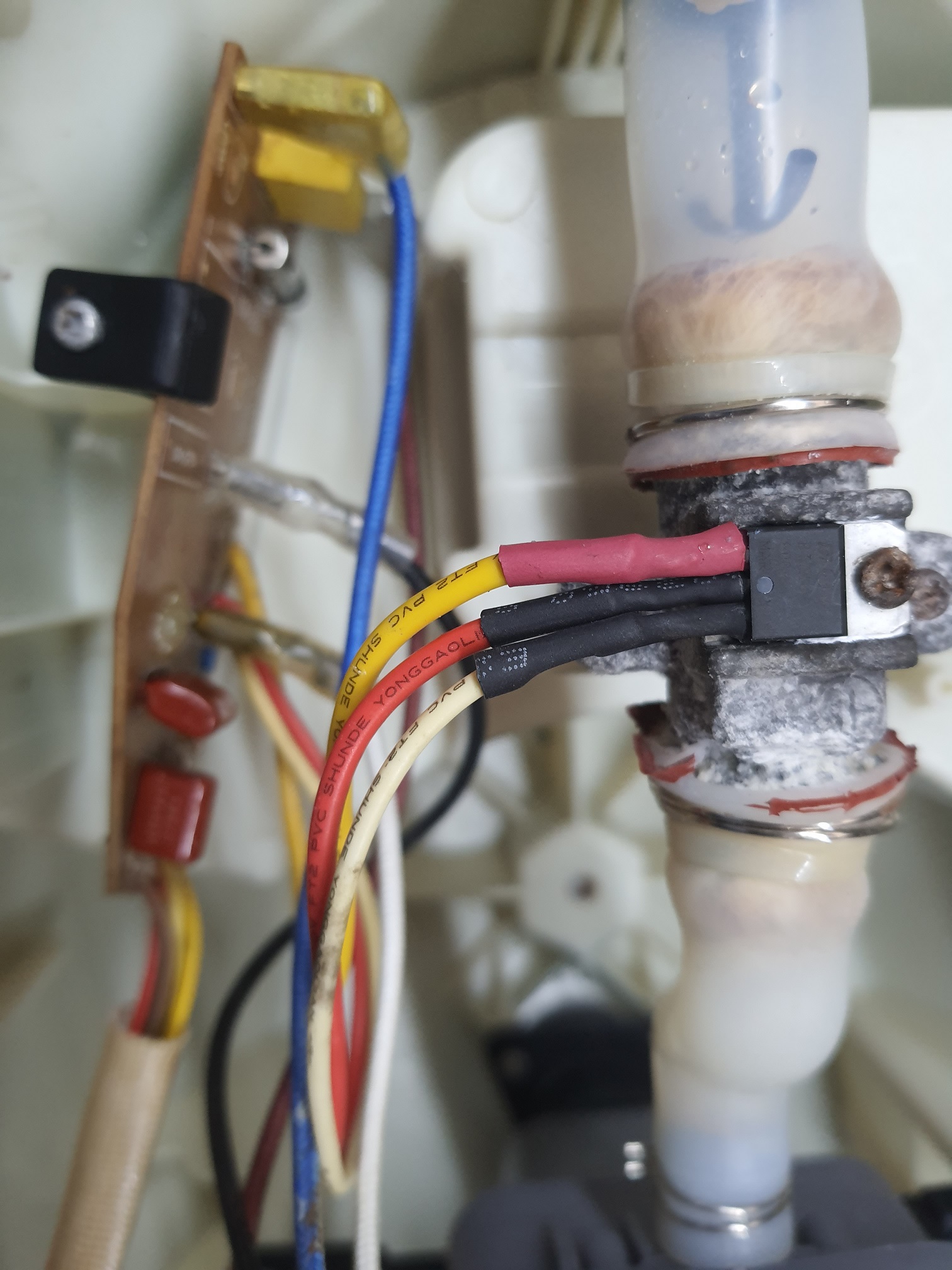 ซ่อมเตารีดไอน้ำ ยี่ห้อ @HOME รุ่น HO0065 อาการไอน้ำไม่ออก