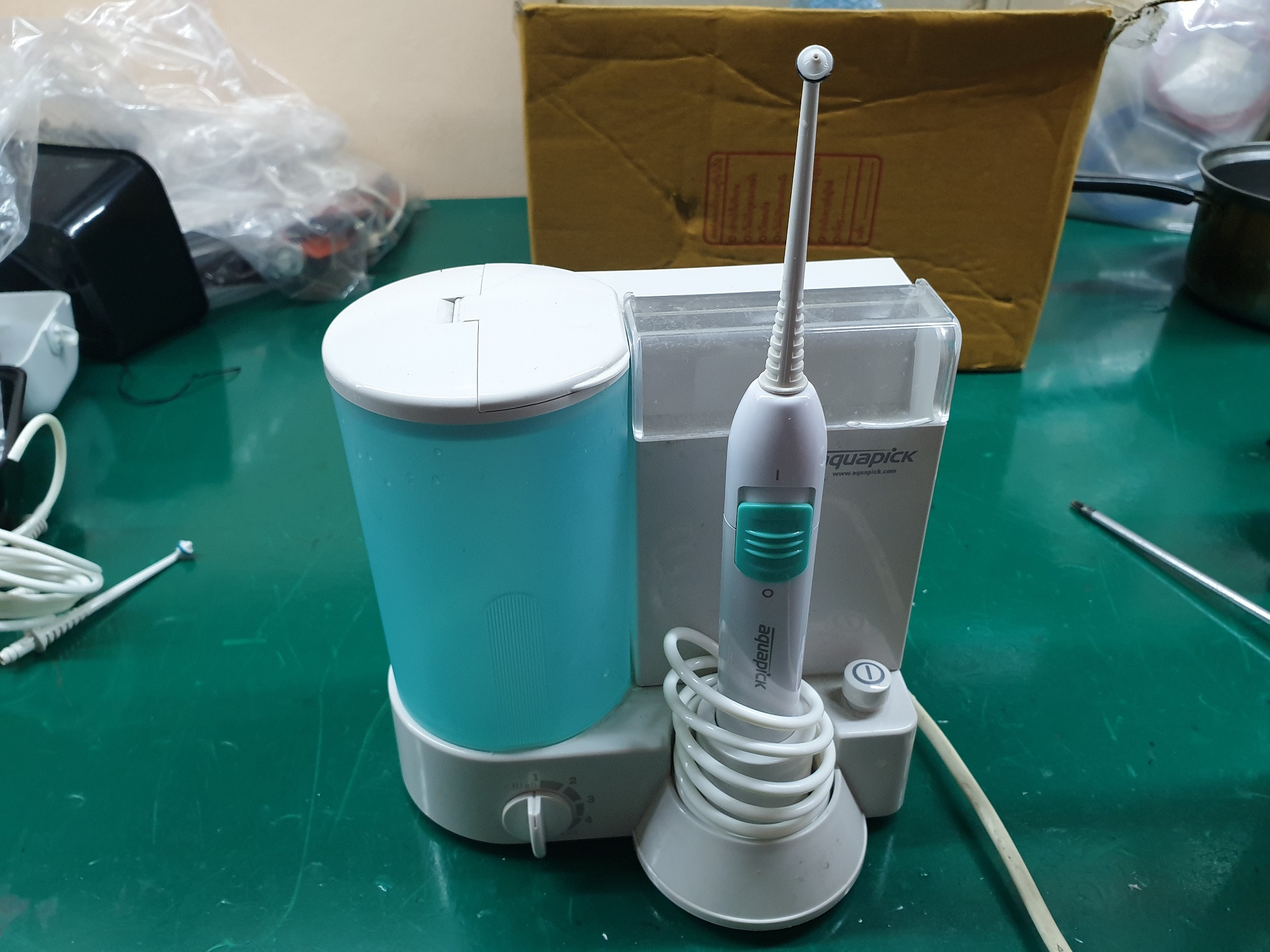 ซ่อมเครื่องทำความสะอาดฟัน ยี่ห้อ Aquapick รุ่น CN-120 อาการท่อส่งน้ำขาด