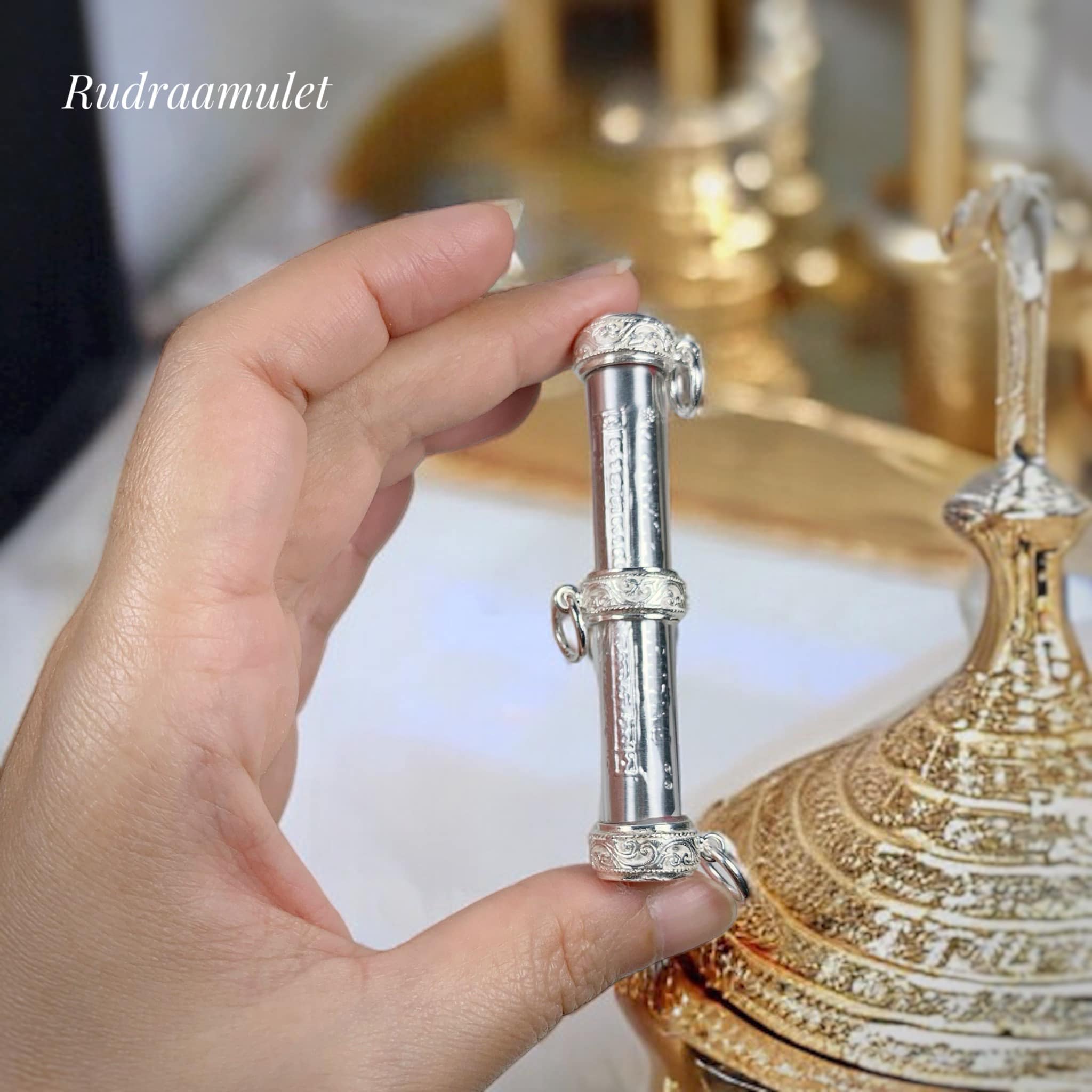 ตะกรุดปั๊มจีวรหัวใจเศรษฐี รุ่นแรก 77 แผ่นยันต์เงิน (หลวงปู่มหาศิลา สิริจันโท)