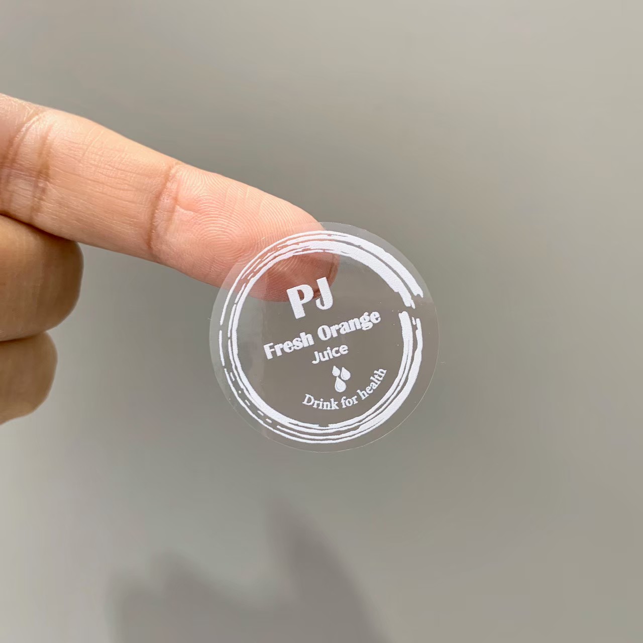 ฉลากสินค้าใสตัวหนังสือขาว สติ๊กเกอร์ใสพิมพ์สีขาว พิมพ์หมึกขาว