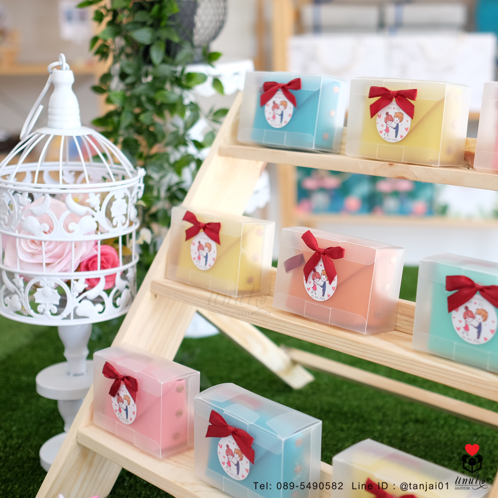 ของชำร่วยงานแต่งงาน กระเป๋าใส่เหรียญสีพาสเทล ติดสติ๊กเกอร์ป้ายชื่อ และโบว์ เลือกสีโบว์ตามธีมงานได้จ้า