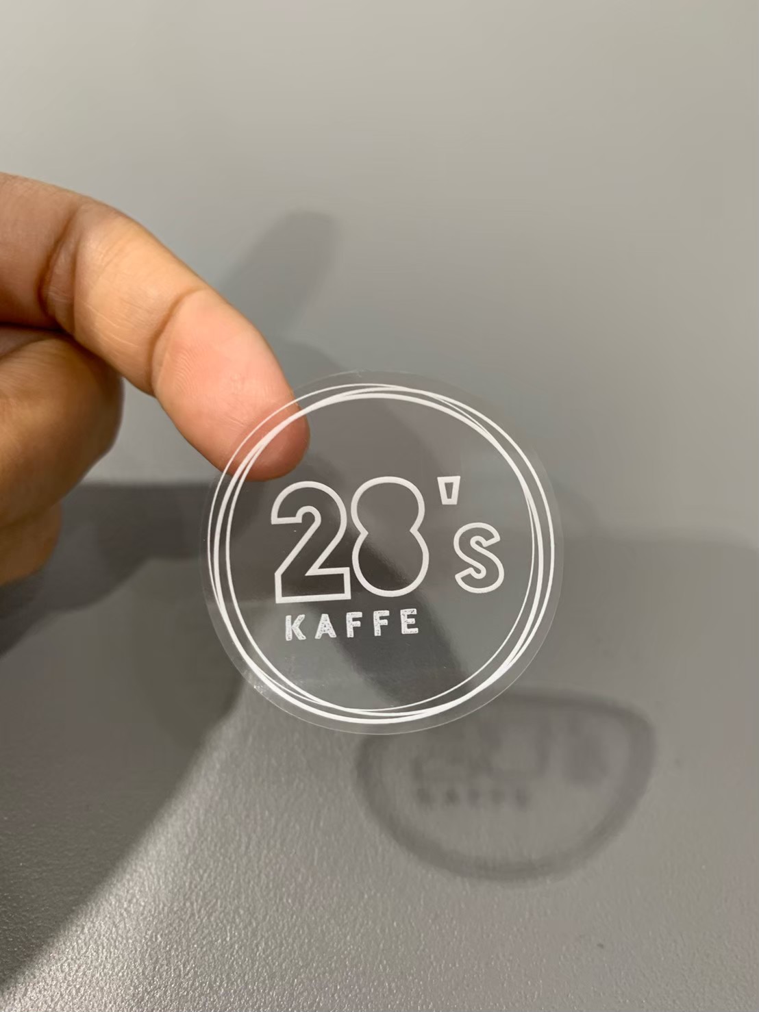 ฉลากสินค้าใสตัวหนังสือขาว สติ๊กเกอร์ใสพิมพ์สีขาว พิมพ์หมึกขาว