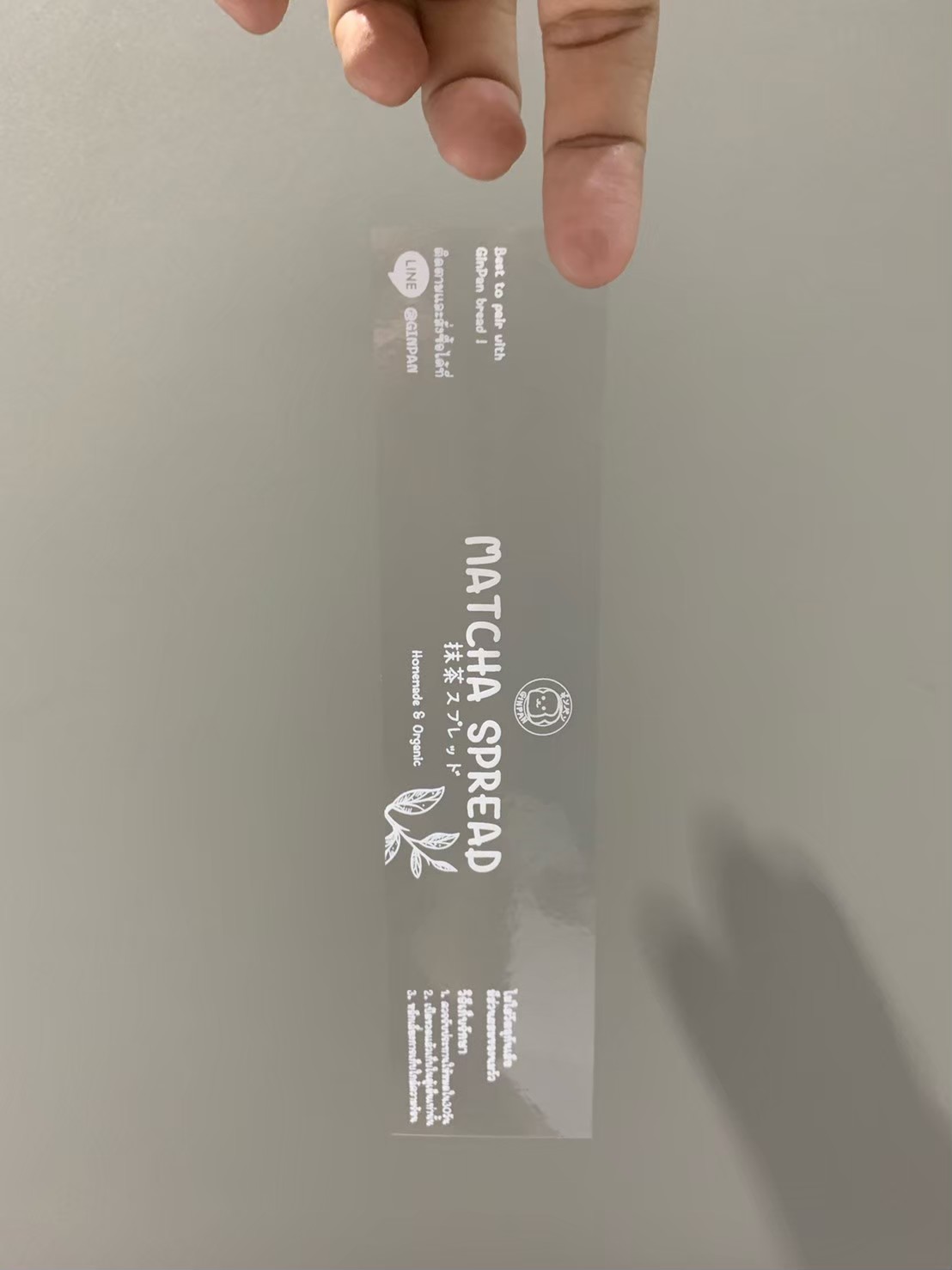 ฉลากสินค้าใสตัวหนังสือขาว สติ๊กเกอร์ใสพิมพ์สีขาว พิมพ์หมึกขาว