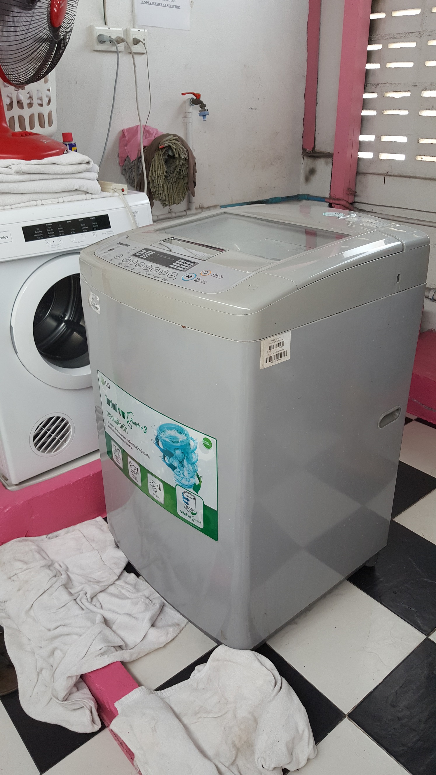 ซ่อมเครื่องซักผ้า ยี่ห้อ LG รุ่น WF-T1255TD อาการขณะที่เครื่องทำการซักจะมีเสียงดังแก๊กๆ