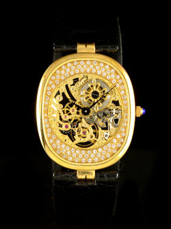 **ขายแล้ว** Patek Philippe Golden Ellipse Ref.3881 หน้าปัดทองคำแกะสลัก ฝังเพชร ตัวเรือนทองคำ หลังเปลือยทองคำแกะสลัก สายหนังแท้ หัวเข็มขัดแท้ ไขลาน ขนาด 32 x 27 mm