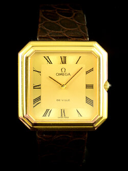 Omega De ville หน้าปัดสีทอง หลักเลขโรมัน ตัวเรือนสี่เหลียม Asscher Silverหุ้มทอง สายหนังและหัวเข็มขัดแท้ ปี1973 ไขลาน 32 x 32 mm